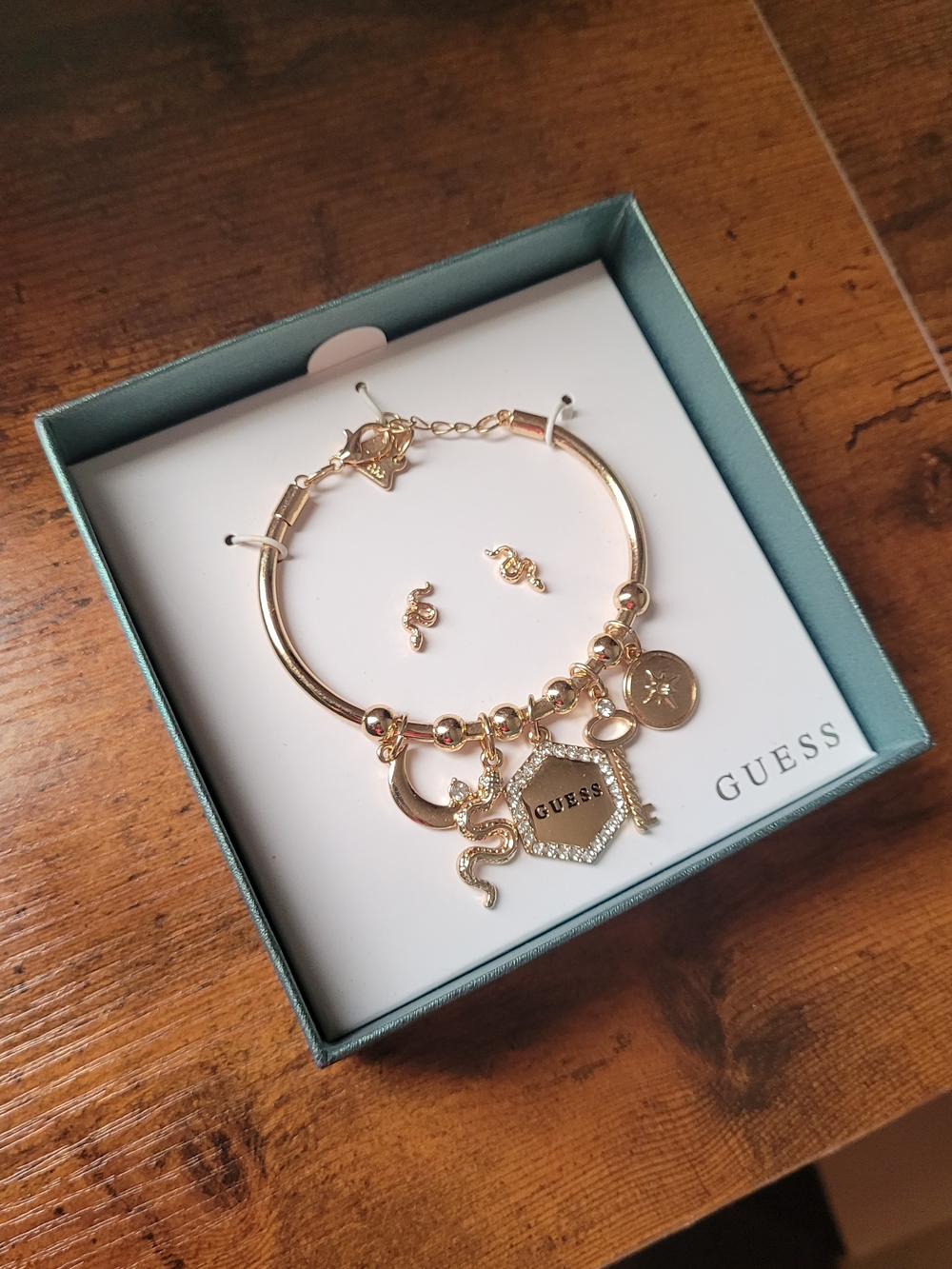 GUESS Gold-Tone Charm Bracelet and Earring Set